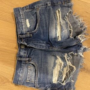 RIPPED JEAN SHORTS